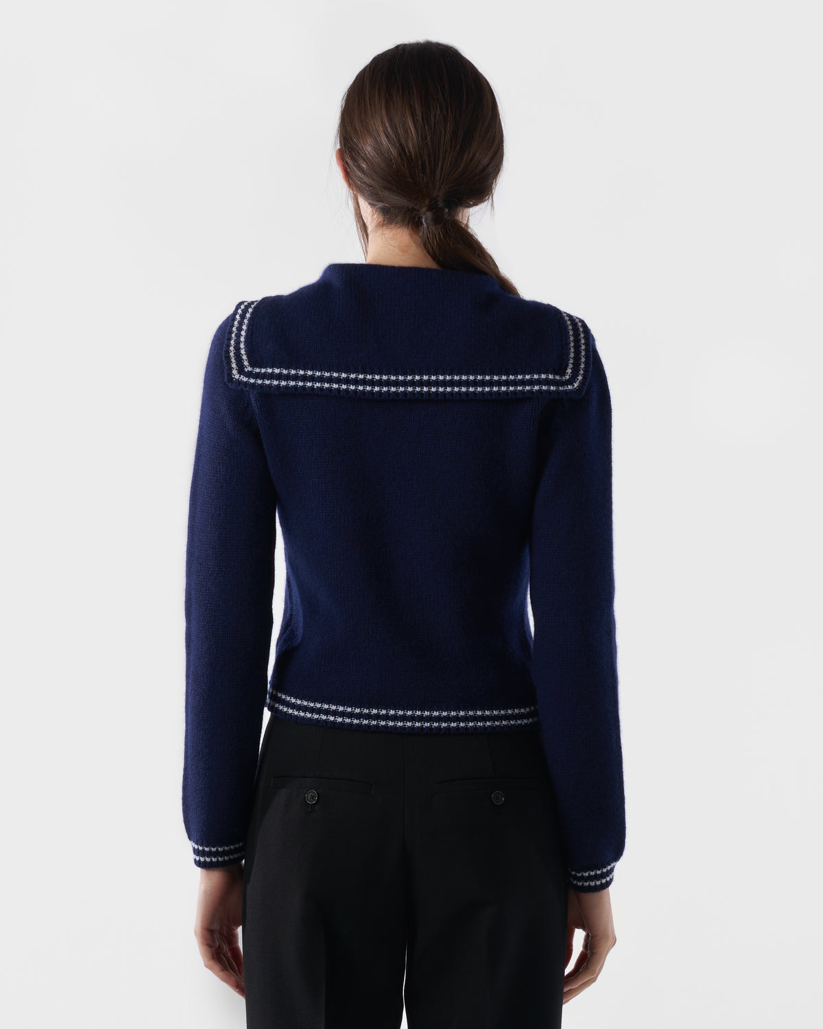 Sailor-collar cardigan in British Blue lambswool, worn, back view