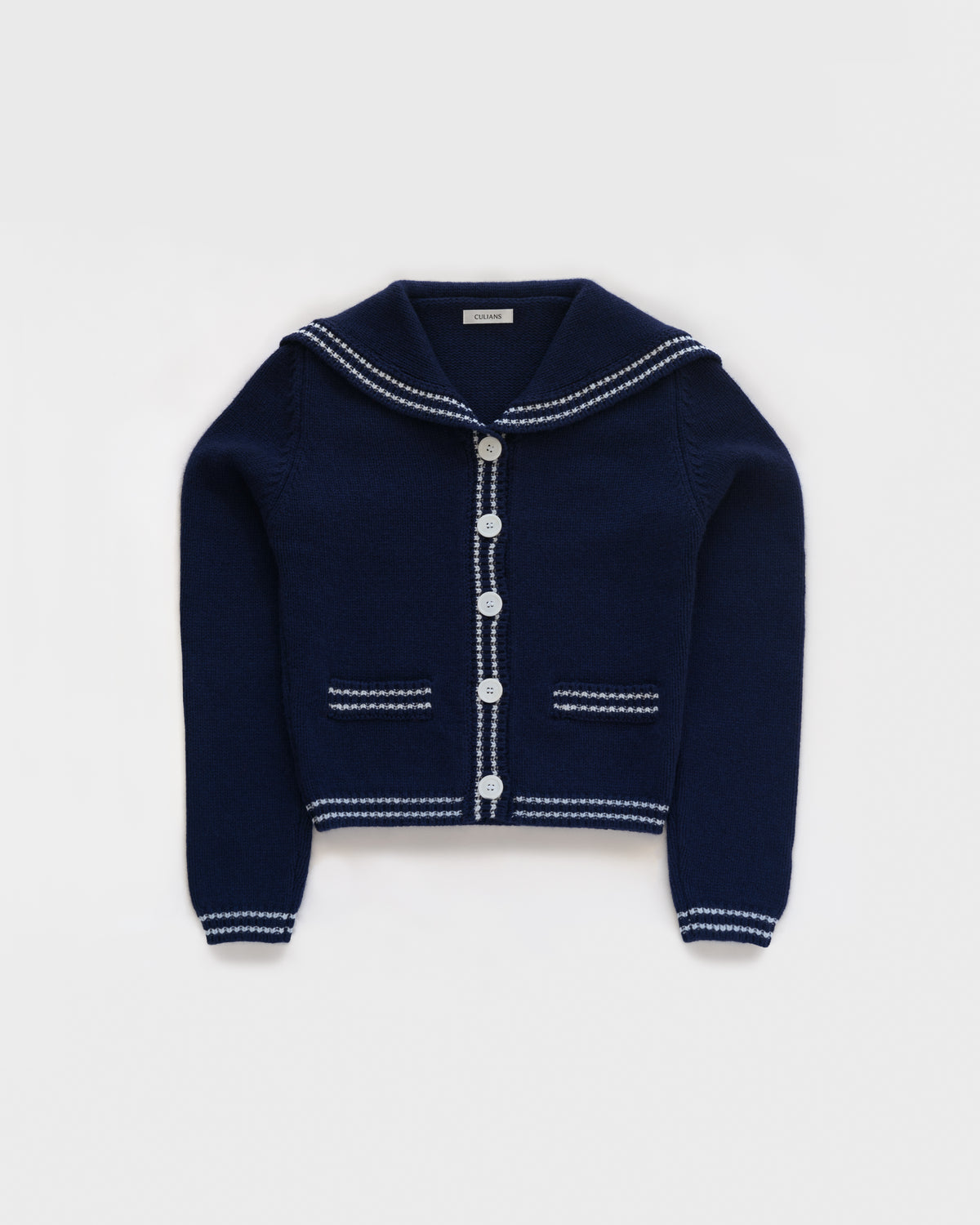 Sailor-collar cardigan in British Blue lambswool, flatlay
