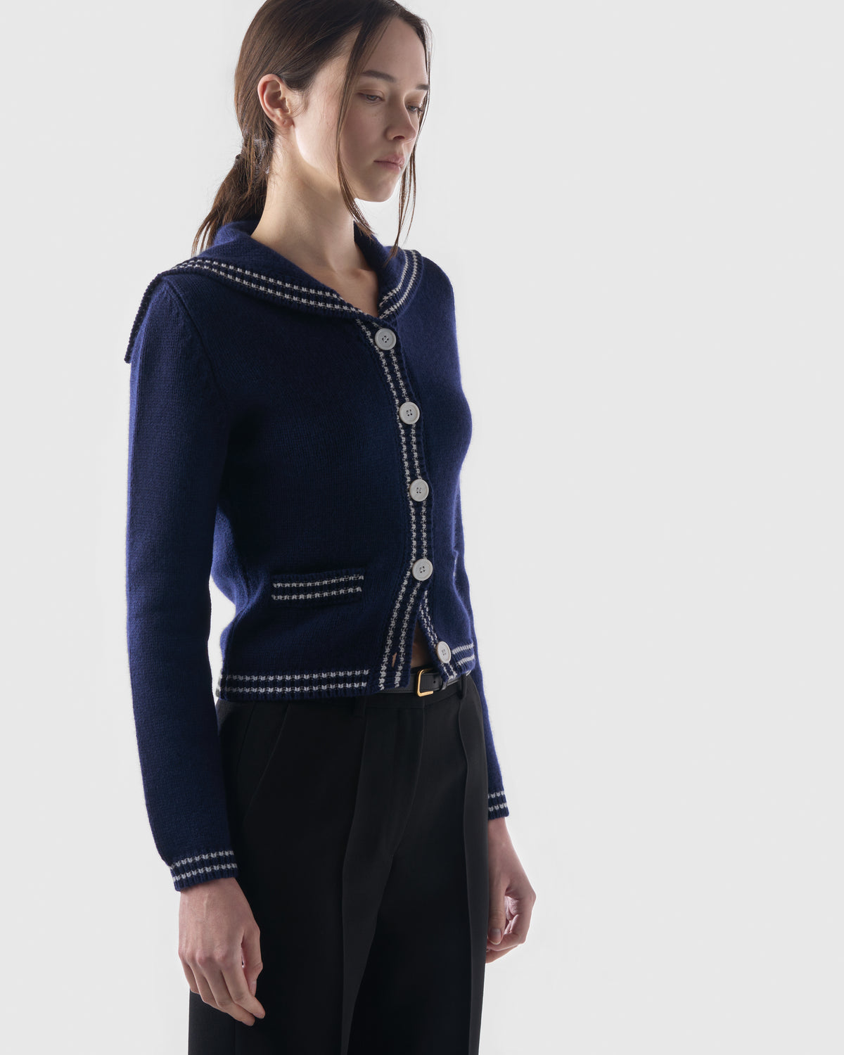 Sailor-collar cardigan in British Blue lambswool, worn, side view