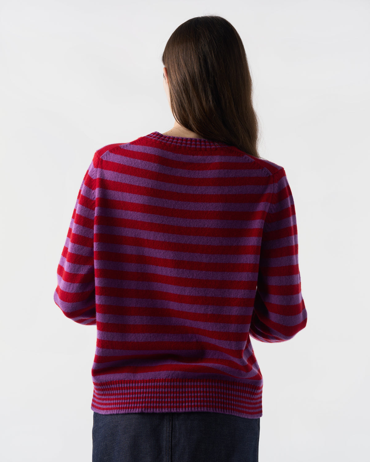 Striped crewneck in Sari Purple and Ruby Red lambswool, worn, back view