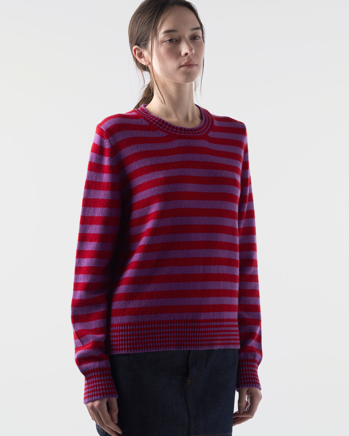 Striped crewneck in Sari Purple and Ruby Red lambswool, worn, front view, alternate angle